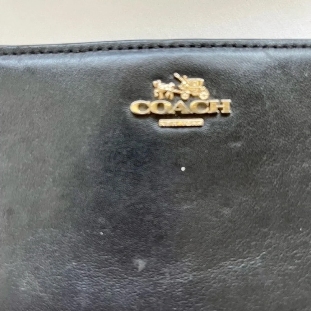 COACH Black leather skinny wallet